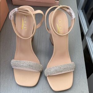 Glaze Beige Strappy Heels with Rhinestone Front Band
Size 6.5 new